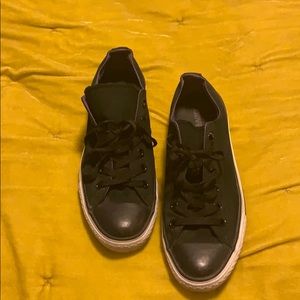 Black and purple low top converse